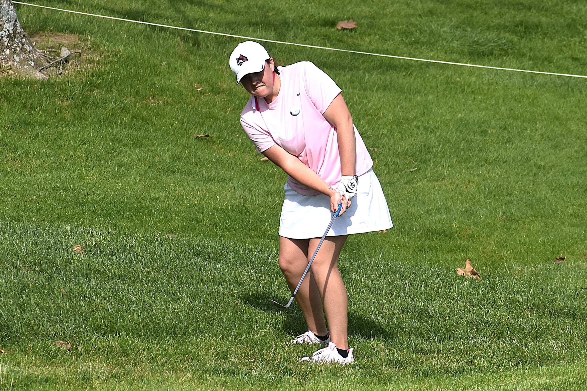 Sophia Curry chips in for a birdie on No. 9 during the Forest Hills Invitational on April 24.